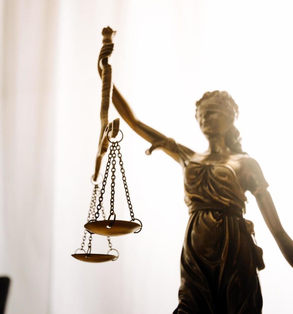 Scales of justice in the offices of Shelander Law Firm